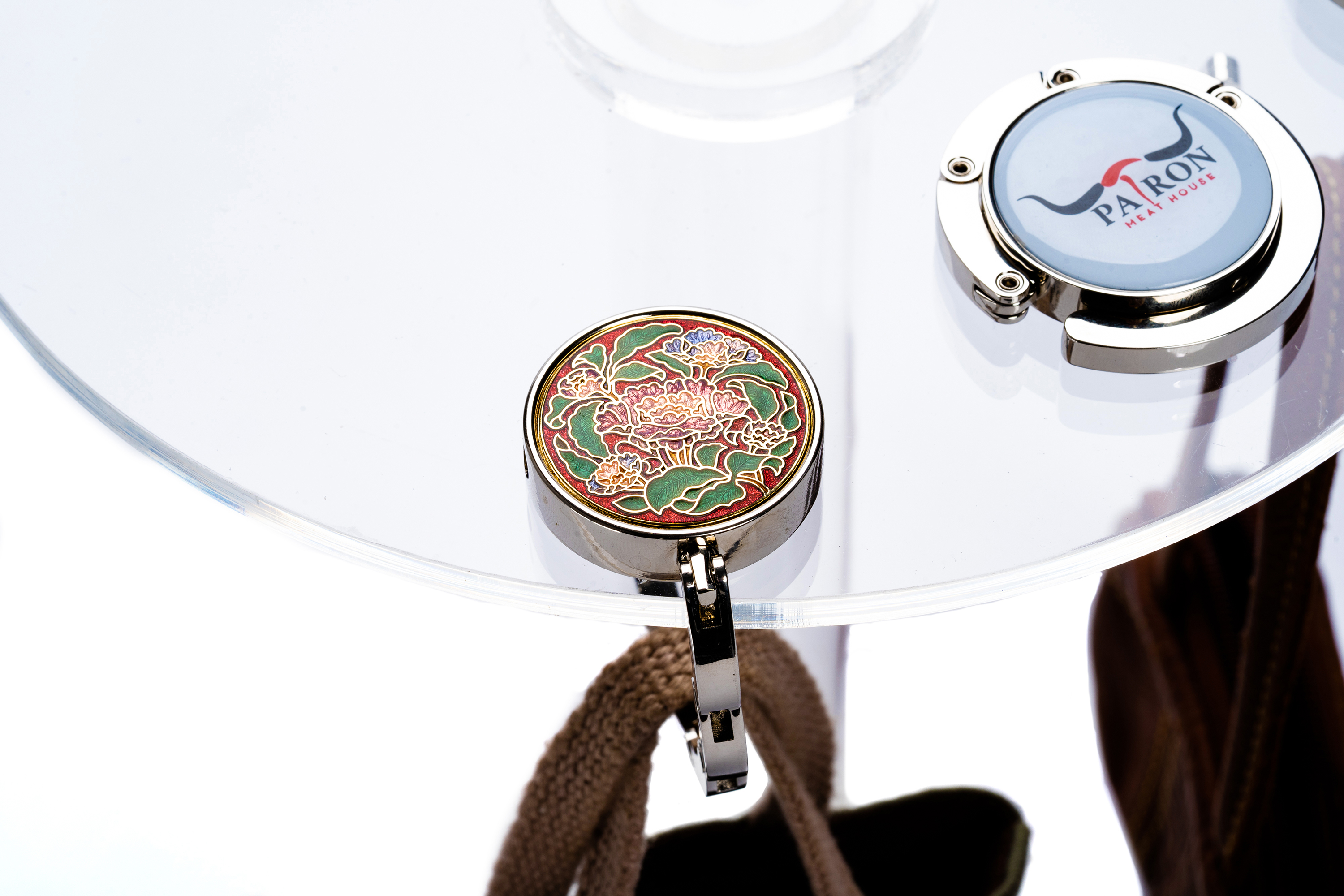 cloisonne retractable bag hanger